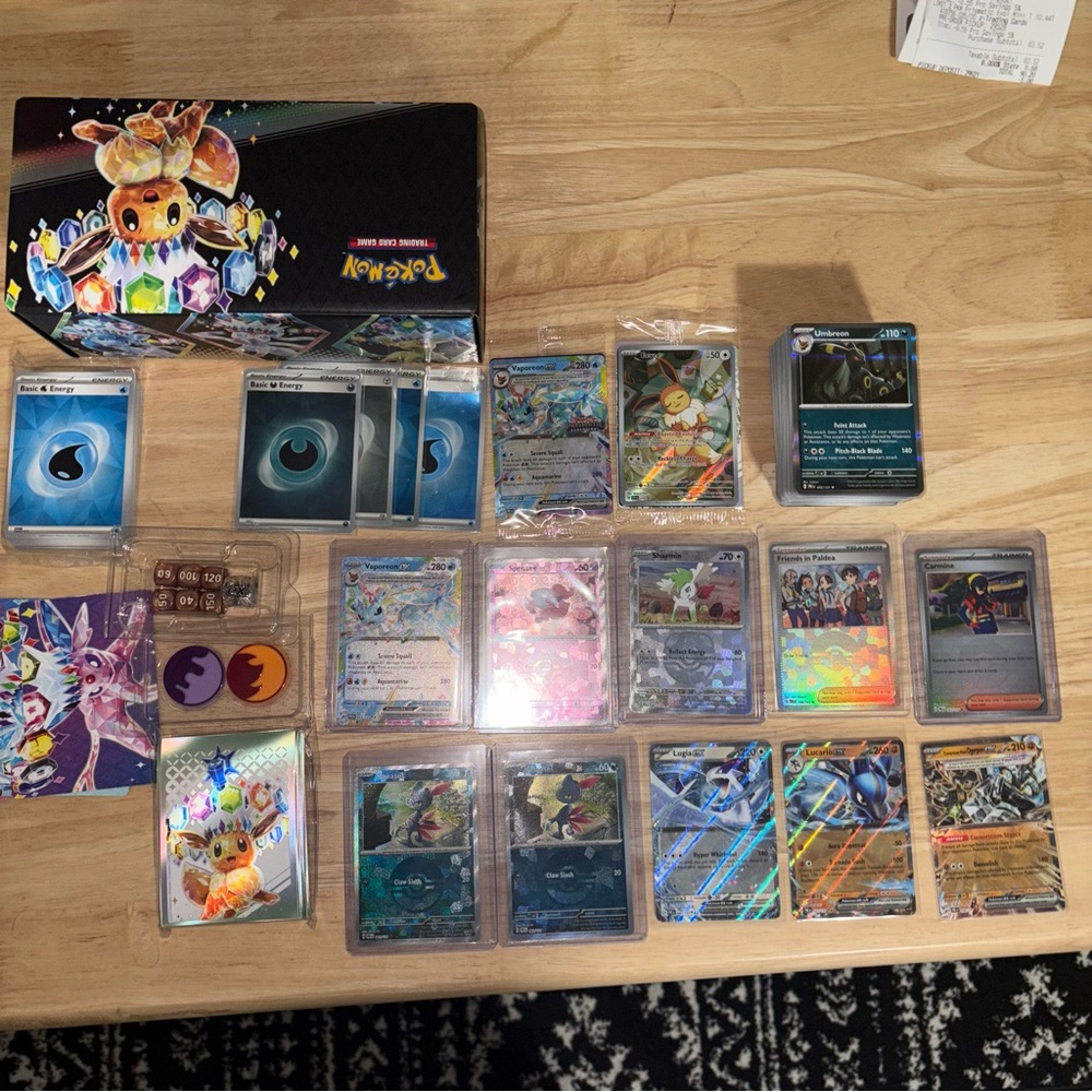 Pokémon Prismatic Evolution Cards (Eevee ETB promo , Vaporeon Suprise Box Promo)